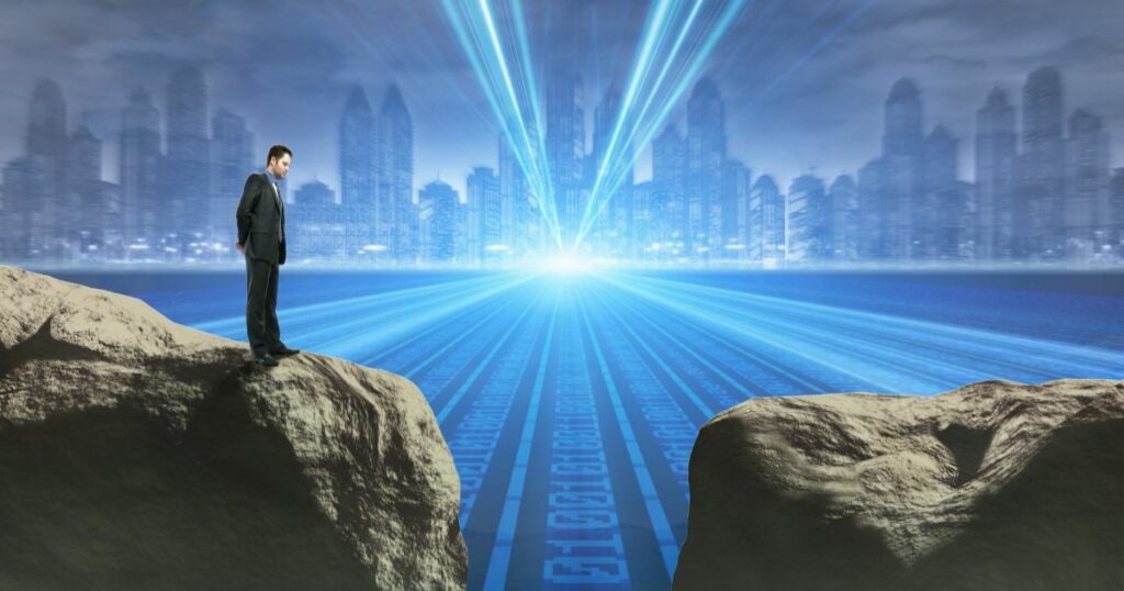 Harnessing Digital Technology for Business - Digital Skills Gap. Image shows a man standing next to a gap on some rock, with a digital landscape behind him.
